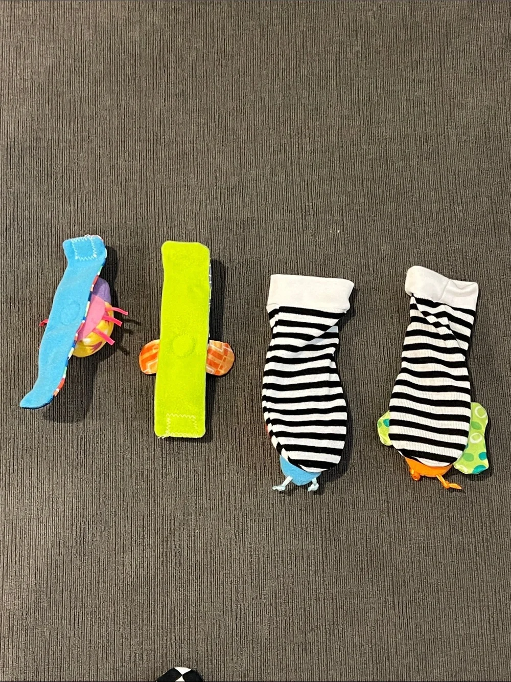 Like New Set of 4 Baby Wrist and Foot Rattles with Colorful Bug Designs